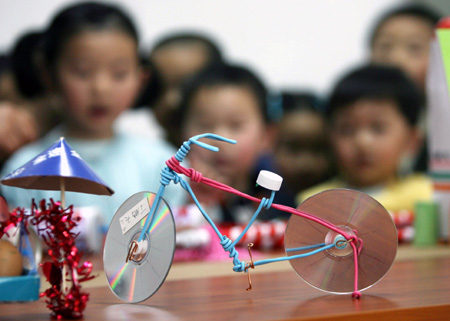 A Handicraft Made Of Waste Materials Is Shown To Children In Hongqiao Kindergarten Suzhou East Chinas Jiangsu Province April 20 2009 A Handicraft Made Of Waste Materials Is Shown To Children In Hongqiao Kindergarten Suzhou East Chinas Jiangsu Province April 20 2009
