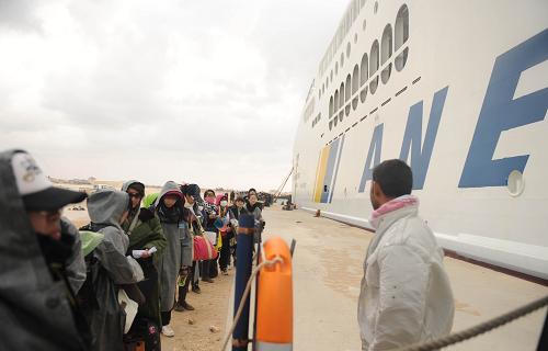 利比亚撤侨亲历者讲述回国之旅_利比亚撤侨网易_利比亚紧急撤侨