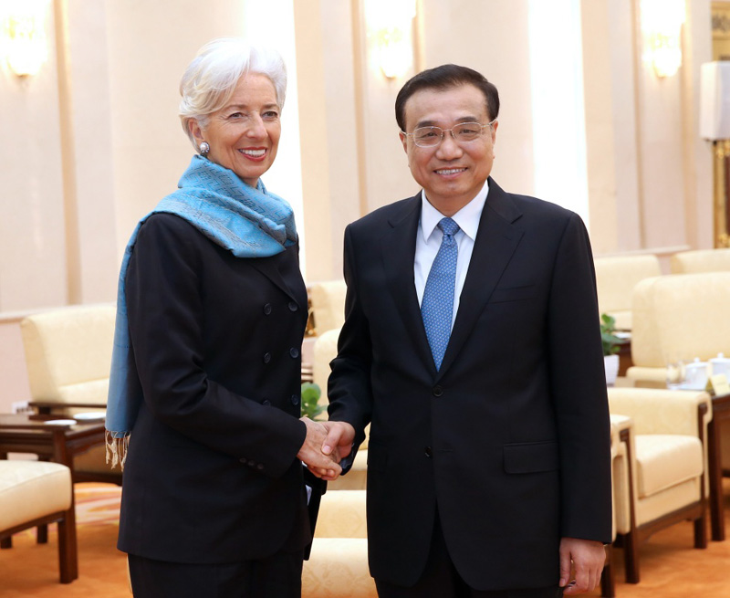 3月21日，国务院总理李克强在北京人民大会堂会见来华出席中国发展高层论坛2016年年会的国际货币基金组织总裁拉加德。