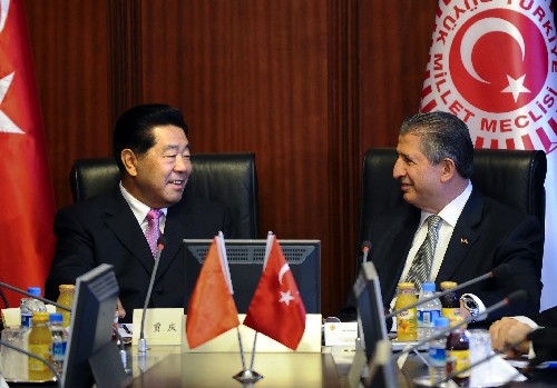 贾庆林与土耳其大国民议会议长托普坦举行会谈