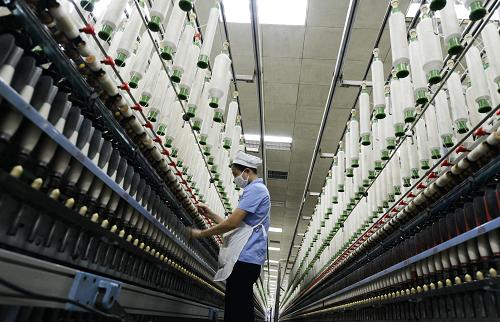 邹平县的世界最大棉纺织企业--魏桥创业集团在