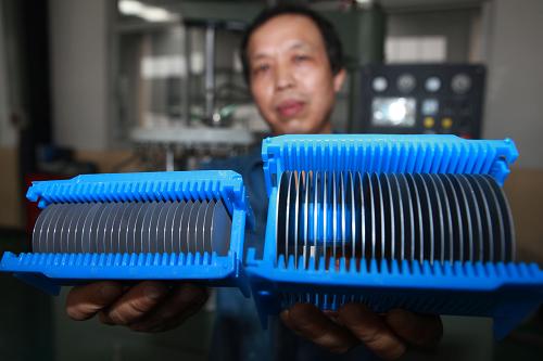 国内自主研发区熔单晶硅炉江西九江试产成功