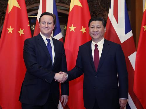 12月2日,国家主席习近平在北京钓鱼台国宾馆会见英国首相卡梅伦。新华社记者 鞠鹏 摄