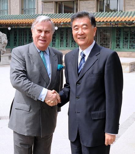 国务院副总理汪洋在京分别会见法国、英国客人