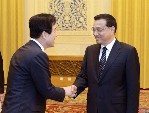 李克强12日在北京会见韩国三星集团副会长崔