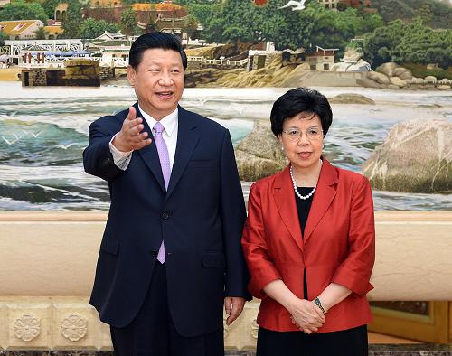 8月20日,国家主席习近平在北京人民大会堂会见世界卫生组织总干事陈冯富珍。新华社记者 李涛 摄