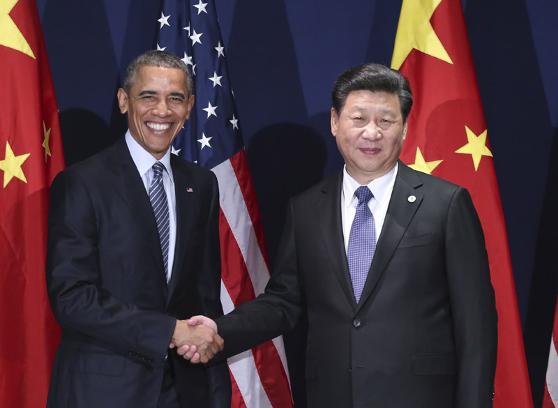11月30日，中国国家主席习近平在巴黎会见美国总统奥巴马。