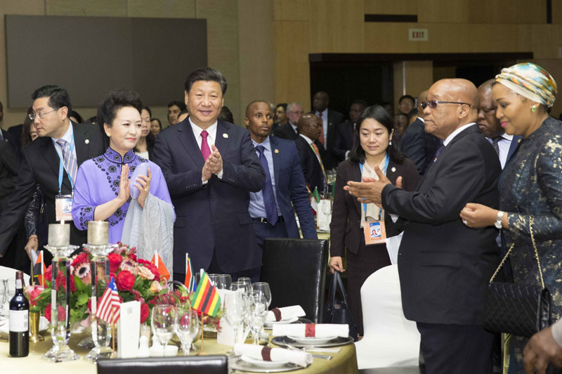 12月3日，国家主席习近平和夫人彭丽媛在南非约翰内斯堡出席中非合作论坛峰会欢迎宴会。