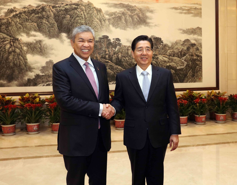 2月2日，中国国务委员、公安部部长郭声琨在北京与马来西亚副总理兼内政部长扎希德举行会谈。新华社记者 刘卫兵 摄