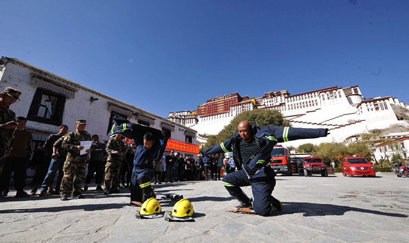 拉萨举行消防安全技能大赛_图片新闻_中国政府网