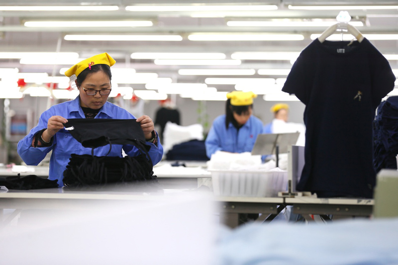正在磨练出口到表洋商场的装束产物山东青岛市即墨区即发团体的工人(图5)