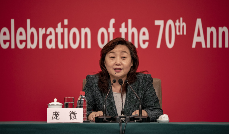 国庆70周年活动新闻中心举办集体采访 介绍群众游行,志