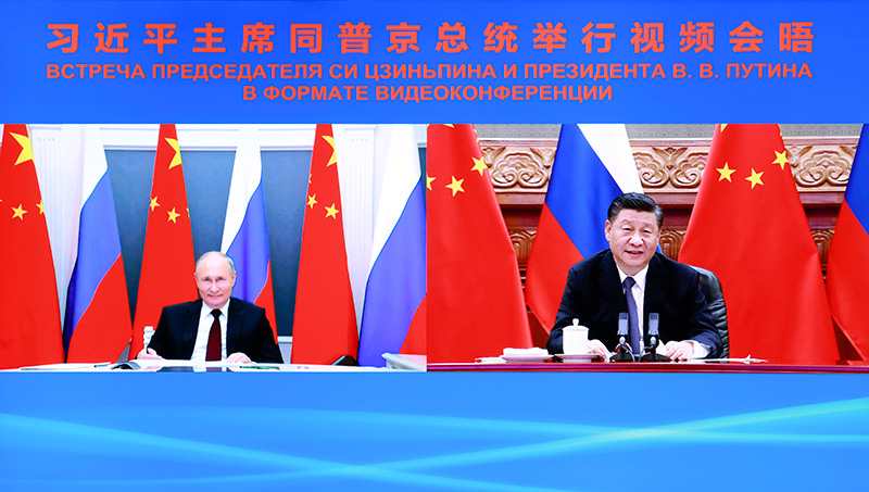 习近平同俄罗斯总统普京举行视频会晤 两国元首宣布《中俄睦邻友好合作条约》延期
