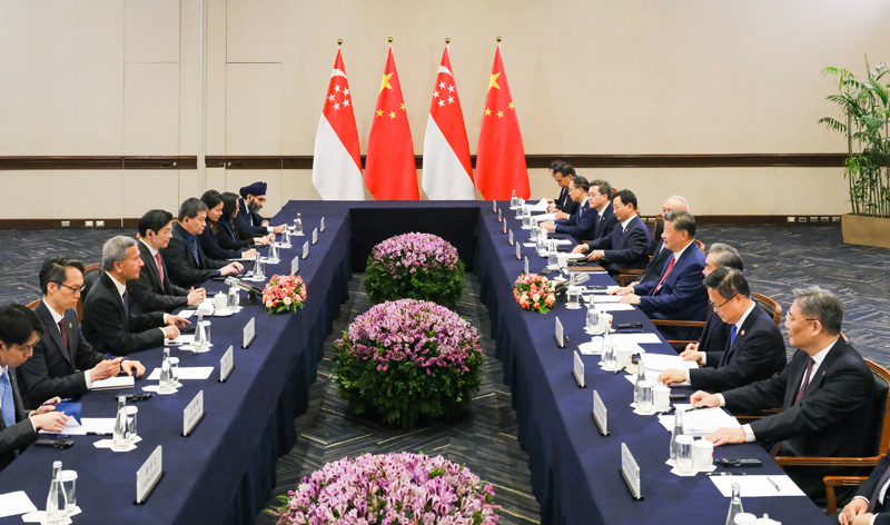 习会见新加坡总理黄循财