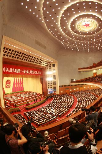 3月9日,十一届全国人大二次会议在北京人民大会堂举行第二次全体会议。 新华社记者庞兴雷摄