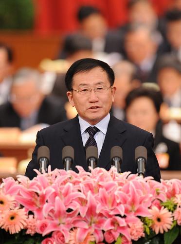 3月10日,全国政协十一届三次会议在北京人民大会堂举行第四次全体会议。这是金晏山委员作《我替贫困地区村官说句话》的发言。 新华社记者 黄敬文 摄