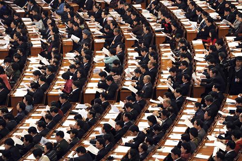 3月11日,十一届全国人大三次会议在北京人民大会堂举行第四次全体会议。新华社记者 杨宗友 摄