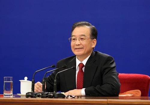 3月14日,国务院总理温家宝在北京人民大会堂与中外记者见面,并回答记者提问。新华社记者谢环驰 摄