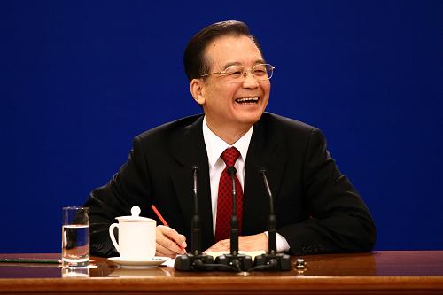3月14日,国务院总理温家宝在北京人民大会堂与中外记者见面,并回答记者提问。 新华社记者姚大伟 摄