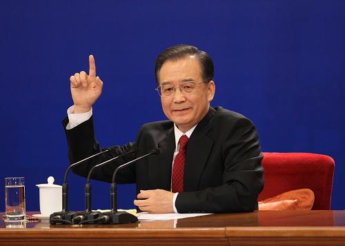 3月14日,国务院总理温家宝在北京人民大会堂与中外记者见面,并回答记者提问。 新华社记者刘卫兵 摄