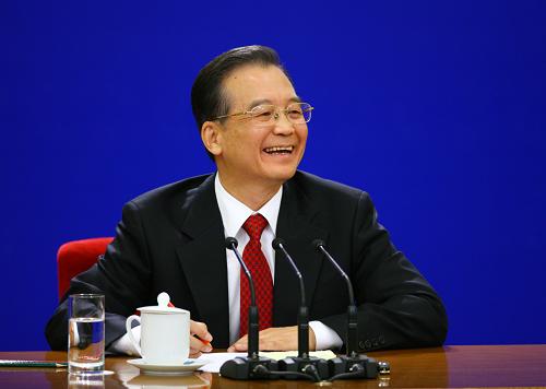 3月14日,国务院总理温家宝在北京人民大会堂与中外记者见面,并回答记者提问。 新华社记者陈建力 摄