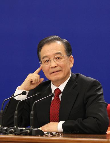 3月14日,国务院总理温家宝在北京人民大会堂与中外记者见面,并回答记者提问。 新华社记者丁林 摄