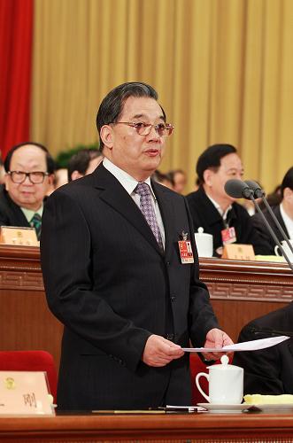 3月9日,全国政协十一届四次会议在北京人民大会堂举行第三次全体会议。李金华主持会议。新华社记者 鞠鹏 摄