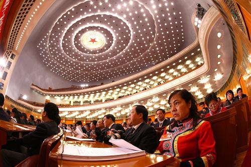3月10日,十一届全国人大四次会议在北京人民大会堂举行第二次全体会议。这是代表们在听会。新华社记者 陈建力 摄