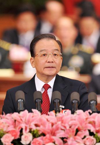 3月5日,第十一届全国人民代表大会第四次会议在北京人民大会堂开幕。国务院总理温家宝作政府工作报告。 新华社记者黄敬文摄