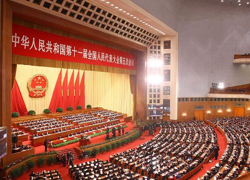 3月9日,十一届全国人大五次会议在北京人民大会堂举行第三次全体会议。新华社记者 陈建力 摄