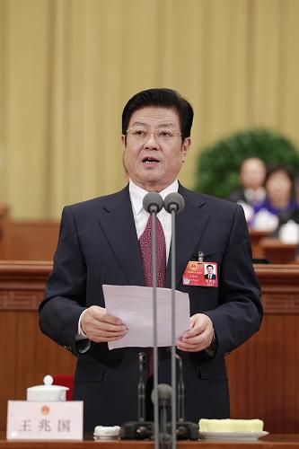 3月9日,十一届全国人大五次会议在北京人民大会堂举行第三次全体会议。全国人大常委会副委员长王兆国主持会议。新华社记者 鞠鹏 摄