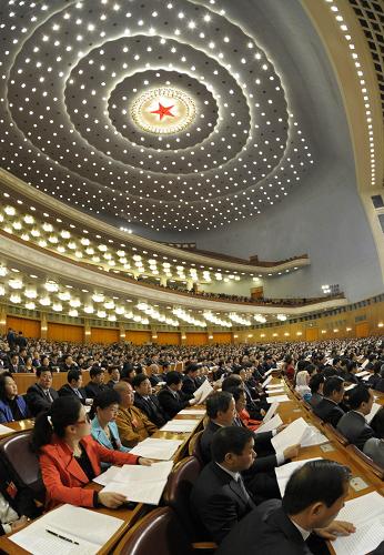 3月9日,十一届全国人大五次会议在北京人民大会堂举行第三次全体会议。新华社记者 杨宗友 摄