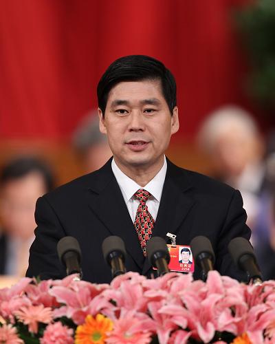 3月10日,全国政协十一届五次会议在北京人民大会堂举行第三次全体会议。这是钱学明委员作《解决拖欠农民工工资要对症下药》的发言。新华社记者 丁林 摄