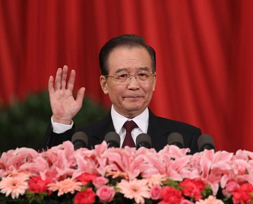 3月5日,第十一届全国人民代表大会第五次会议在北京人民大会堂开幕。国务院总理温家宝作政府工作报告。 新华社记者 刘卫兵 摄