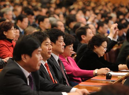 3月14日,第十一届全国人民代表大会第五次会议在北京人民大会堂举行闭幕会。 新华社记者 王建华 摄