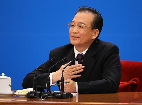 3月14日,国务院总理温家宝在北京人民大会堂与中外记者见面,并回答记者提问。 新华社记者 陈建力 摄