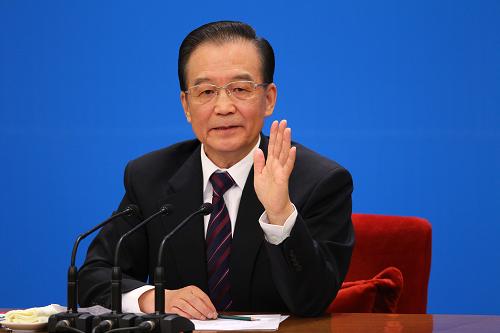 3月14日,国务院总理温家宝在北京人民大会堂与中外记者见面,并回答记者提问。 新华社记者 陈建力 摄
