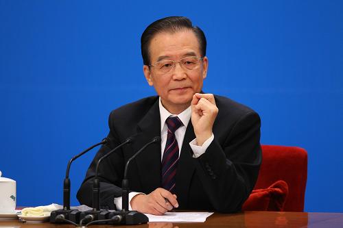 3月14日,国务院总理温家宝在北京人民大会堂与中外记者见面,并回答记者提问。 新华社记者 陈建力 摄