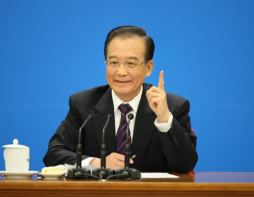 3月14日,国务院总理温家宝在北京人民大会堂与中外记者见面,并回答记者提问。 新华社记者姚大伟 摄