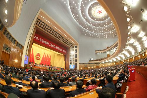 3月16日,十二届全国人大一次会议在北京人民大会堂举行第六次全体会议。新华社记者 陈建力 摄