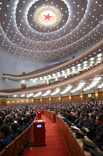 3月16日,十二届全国人大一次会议在北京人民大会堂举行第六次全体会议。新华社记者 刘卫兵 摄
