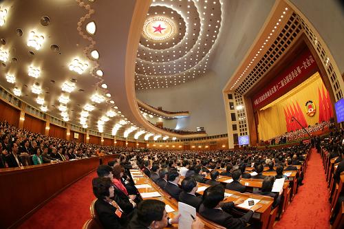 3月3日,中国人民政治协商会议第十二届全国委员会第一次会议在北京人民大会堂开幕。这是全国政协委员在听会。新华社记者李刚摄