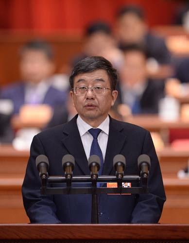 3月8日,全国政协十二届一次会议在北京人民大会堂举行第三次全体会议。这是孙贵宝委员作《尽快制止中央某些政策法规“空转”》的发言。 新华社记者 王晔 摄