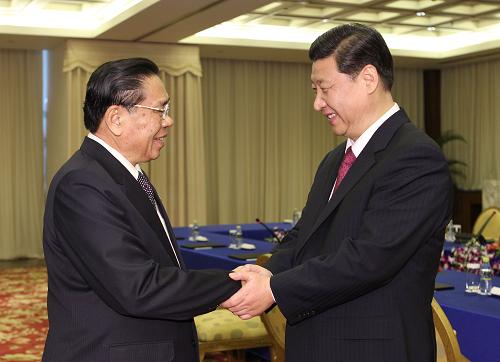 习近平会见老挝国家主席朱马利