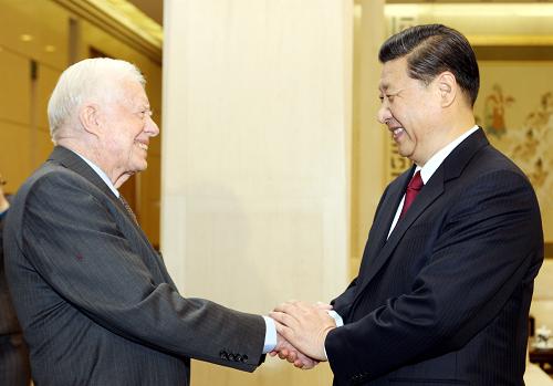 习近平会见美国前总统卡特