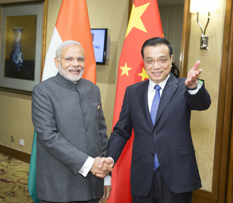 11月21日,中国国务院总理李克强在马来西亚吉隆坡会见印度总理莫迪。