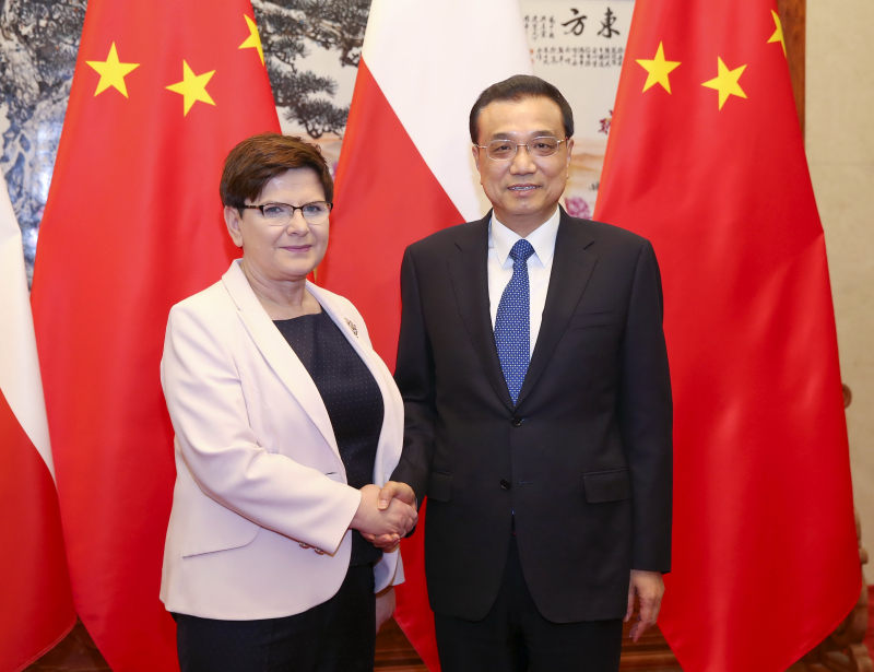 国务院总理李克强12日上午在人民大会堂会见来华出席“一带一路”国际合作高峰论坛的波兰总理希德沃。