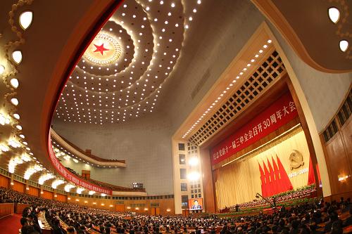 12月18日,纪念党的十一届三中全会召开30周年大会在北京隆重举行。胡锦涛总书记在会上发表重要讲话,强调要在中国特色社会主义道路上,继续把改革开放伟大事业推向前进。1978年12月18日召开的党的十一届三中全会,开启了我国改革开放历史新时期。30年来,党和国家各项事业取得了举世瞩目的新的伟大成就,中国人民大踏步赶上了时代潮流,稳步走上了奔向富裕安康的广阔道路。 新华社发