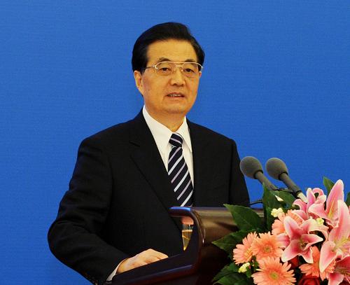 12月11日,国家主席胡锦涛在北京人民大会堂出席中国加入世界贸易组织10周年高层论坛并发表重要讲话。新华社记者 饶爱民 摄