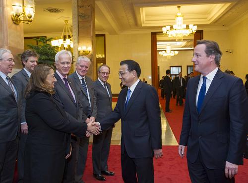 卡梅伦在北京人民大会堂共同会见随同卡梅伦首相访华的英国企业家代表